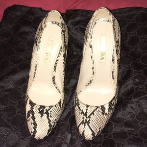 Ladies 38.5 Prada snakeskin heels.